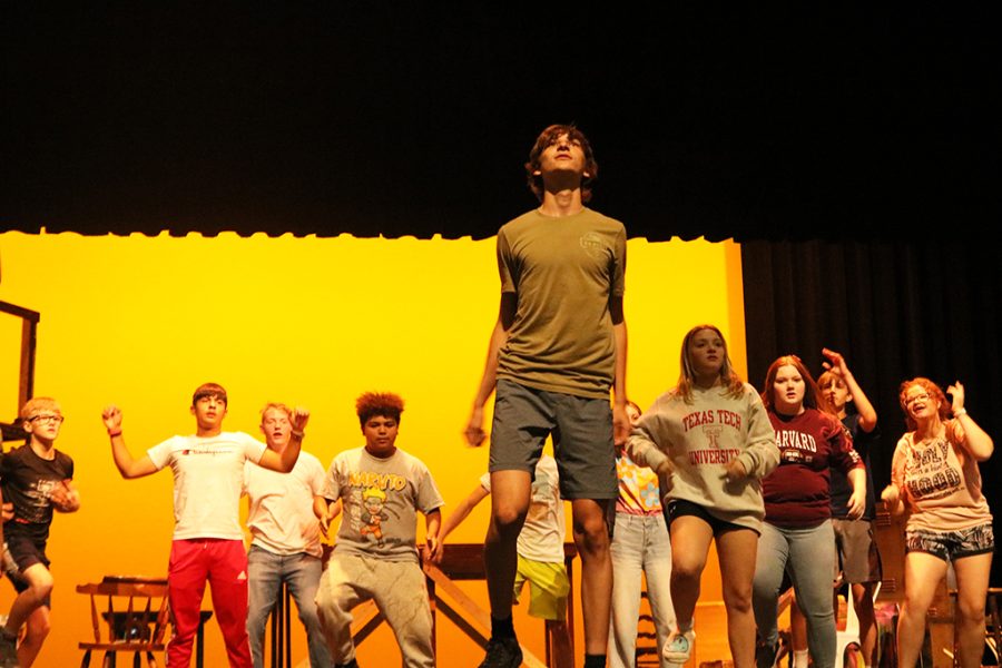 Making+music--Junior+Daniel+Lapusan+leads+a+dance+number+in+Godspell+rehearsals+on+Oct.+4.+The+production+was+postponed+due+to+lighting+outage+in+the+performing+arts+center.
