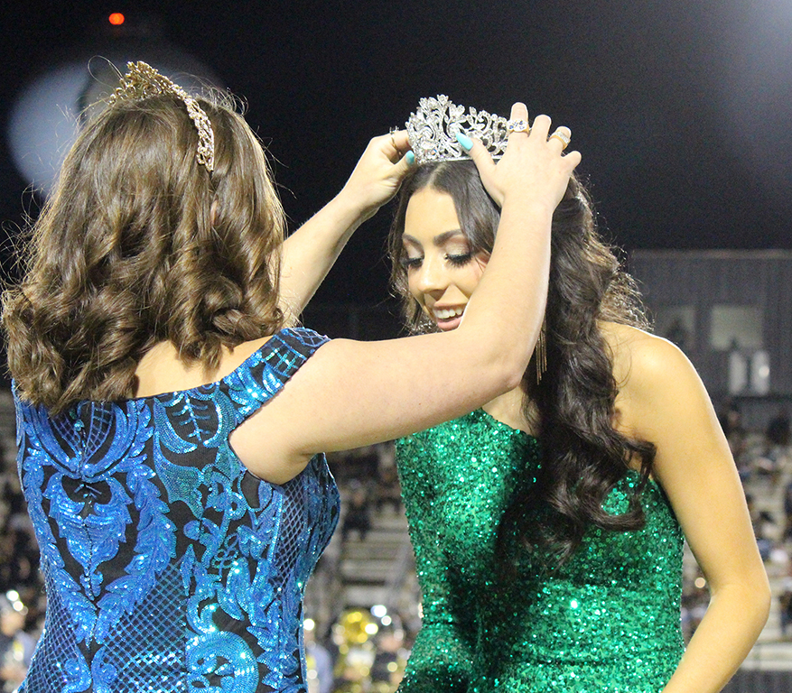 Crowning moment--
2021 Homecoming Queen Emily Alvarez crowns senior Isabella Parkey as the 2022 queen during halftime on Sept. 30.