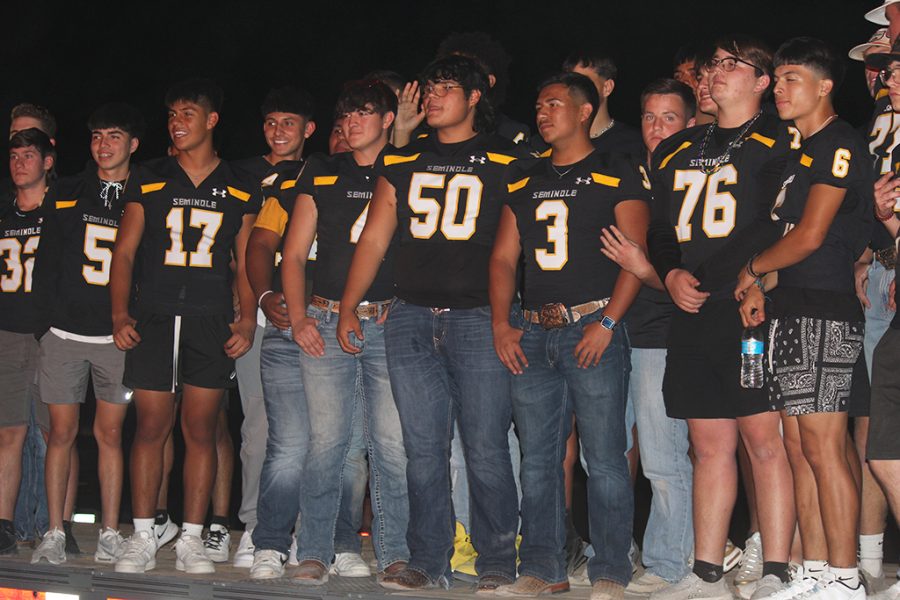 Watch it burn--Varsity football team watches the bonfire on Sept. 29 at Gaines County Park.
