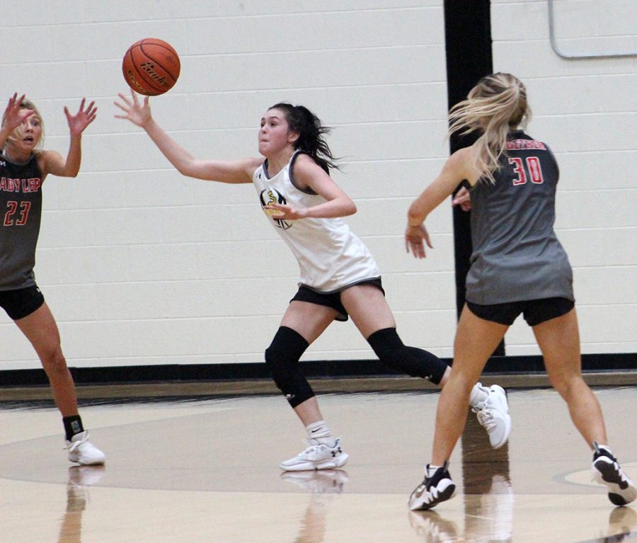 I’ll take that--
Junior guard Londyn Shain gets the steal during a scrimmage with New Home in November. “We are all fast and shoot the ball well,” Shain said.  “I think our quickness can help to get them to turn the ball over.”