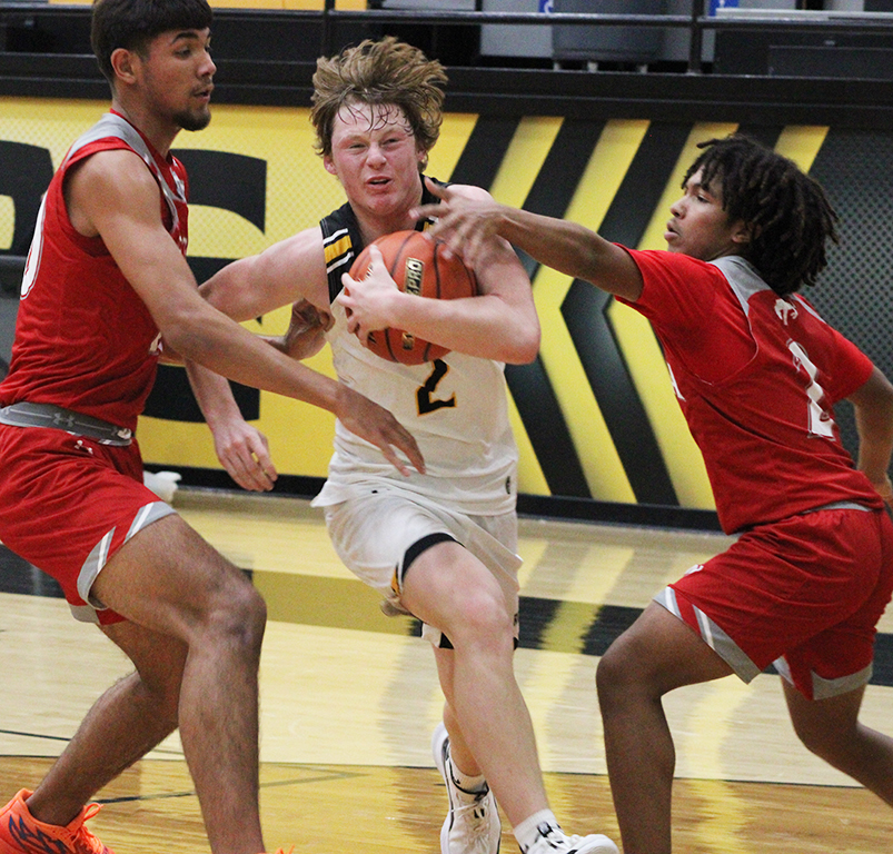 Tough+road+through--%0ASenior+guard+Rylan+McCormick+fights+through+the+Odessa+High+defense+for+a+lay+up+during+preseason+play+on+Tuesday.+The+Indians+fell+to+the+Bronchos%2C+44-42.