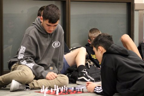 Extra practice--Junior Edison Sheppard and Eduardo Rodarte play chess between contests during the Red Raider Classic UIL meet on Jan. 14. While Rodarte competed in math and science events, Sheppard was part of the piloted chess competition.