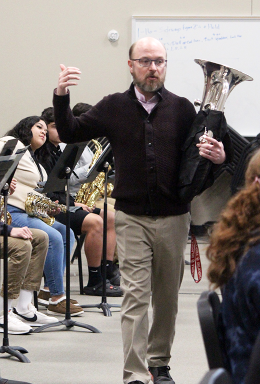 All about sound--
Dr. Russell Pettitt works on tuning during first period band on Jan. 17. Pettitt was hired to take over after Daniel and Christy Barber resigned.
