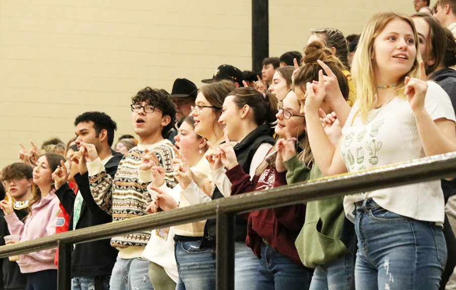 School pride--Seniors sing the school song at their last pep rally on Feb. 3. The pep rally was for basketball court presentation.