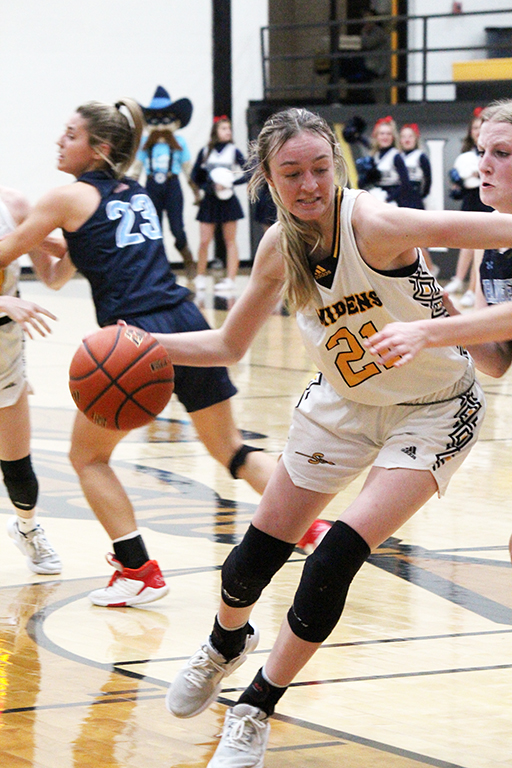 Driving in--Junior forward Tatum Medlin goes to the basket against Greenwood on Feb. 3. Medlin had 10 points in the Maiden victory. 