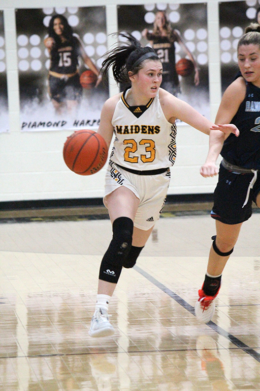 Most valuable player--Junior guard Londyn Shain speeds down the floor against Greenwood on Feb. 2. Shain was selected as the districts top player by the coaches.