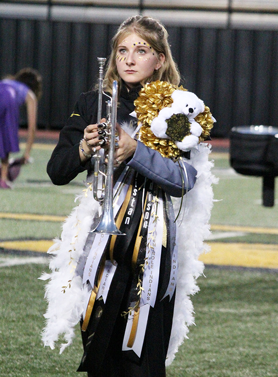 Homecoming uniform--
Junior Adison Thomas sports her mum on her band uniform during the homecoming halftime show on Sept. 8.