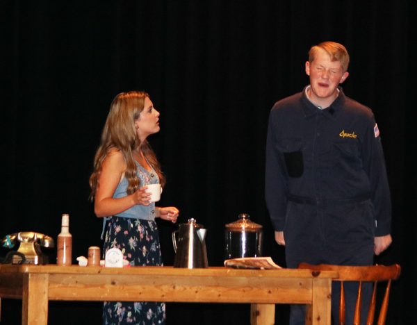 Comedic despair--Juniors Leah Martin and Owen Adam rehearse a scene for Dearly Departed during evening practice in September. The comedy will have four performances beginning Oct. 12.  
