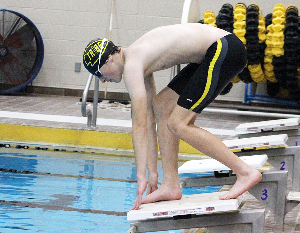 Taking off--
Senior Jeremiah Wolf practices on the starting blocks during October work outs. Wolf took third in the 200-yard individual medley at Pecos on Nov. 11.