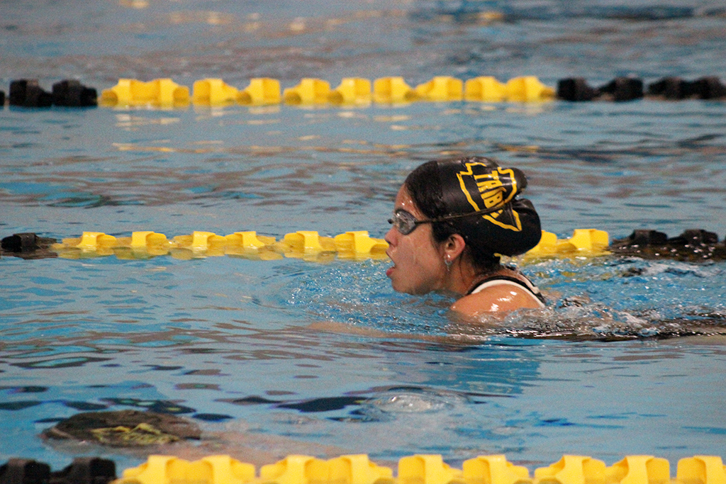 Taking off--
Senior Jeremiah Wolf practices on the starting blocks during October work outs. Wolf took third in the 200-yard individual medley at Pecos on Nov. 11.