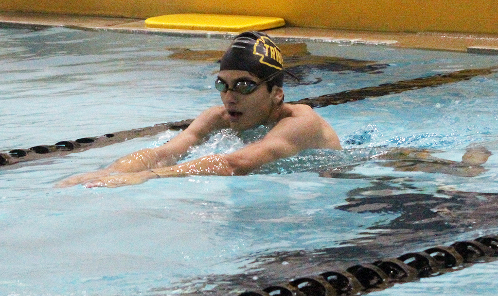 Getting ready--Sophomore Carlos Arzate swims laps during practice on Jan. 11. Arzate would qualify for regionals in two individual events and two relays the next week.