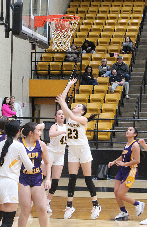 Adding up--Senior guard London Shain scores two of her 18 points against Pecos on Jan. 23. The Maidens defeated the Lady Eagles, 108-5.
