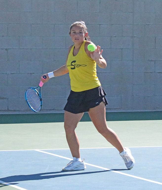 Back at you--Junior Ivy Flores returns fire against Lubbock Cooper Liberty on Oct. 1 during district doubles action. She and partner junior Melany Vazquez Campos defeated Liberty's Peyton Rogers and Marie Kinney, 6-3, 6-4.