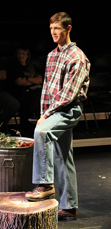 Falling in love--
Drifter Hal Carter, portrayed by senior Matthew Peters, looks into the eyes of local girl Madge Owens, played by junior Violet Barkis Robertson, in a scene from the theater department’s production of Picnic on Nov. 17. The department put on four consecutive performances from Nov. 15-18.