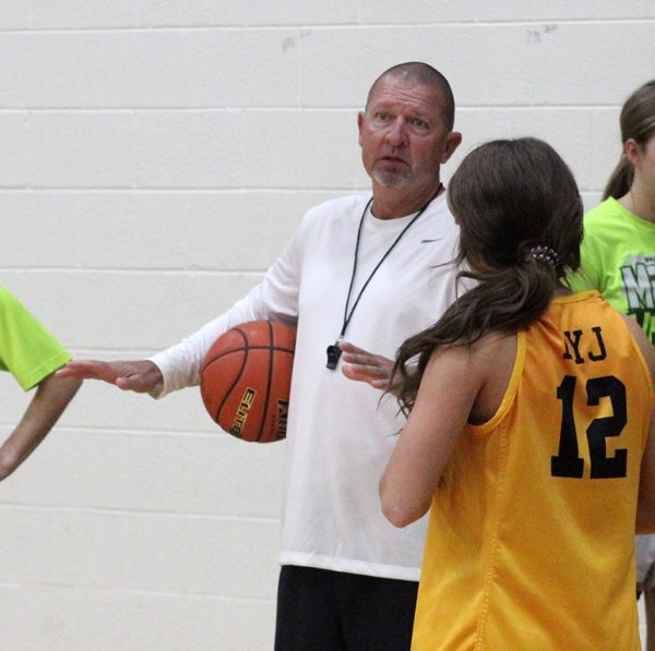 Practice instruction--
Coach Tri Danley explains a point in a play during practice on Oct. 30. The Maidens are 4-0 on the season.