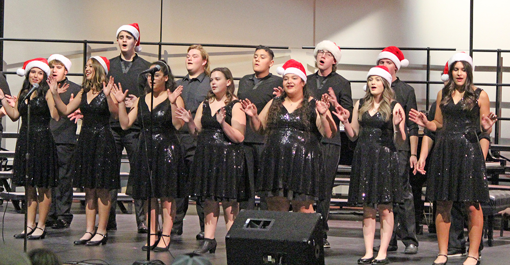 Holiday entertainment--Jazz Brigade members perform during the choirs' Christmas concert on Dec. 16 in the performing arts center. The group did three songs to begin the concert.