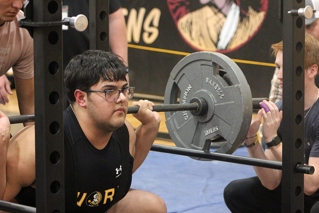 Making weight--
With a squat of  375 pounds, freshman Carlos Lara Vitolas competes in the first event of the home meet in January. His meet total of 1,040 pounds was enough for third place in the super heavy weight diviison.