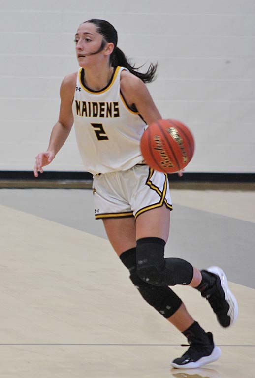 MVP--Sophomore forward Austyn Flowers works a shot against an Andrews player during district on Jan. 28. Flowers was selected as most valuable player by the district coaches.