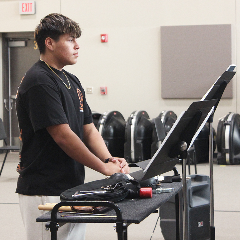 Got the beat--Senior percussionist Noah Villarreal waits for his cue during first period band rehearsals on March 20. Villarreal was part of a percussion ensemble which advanced to state in solo and ensemble on March 24.