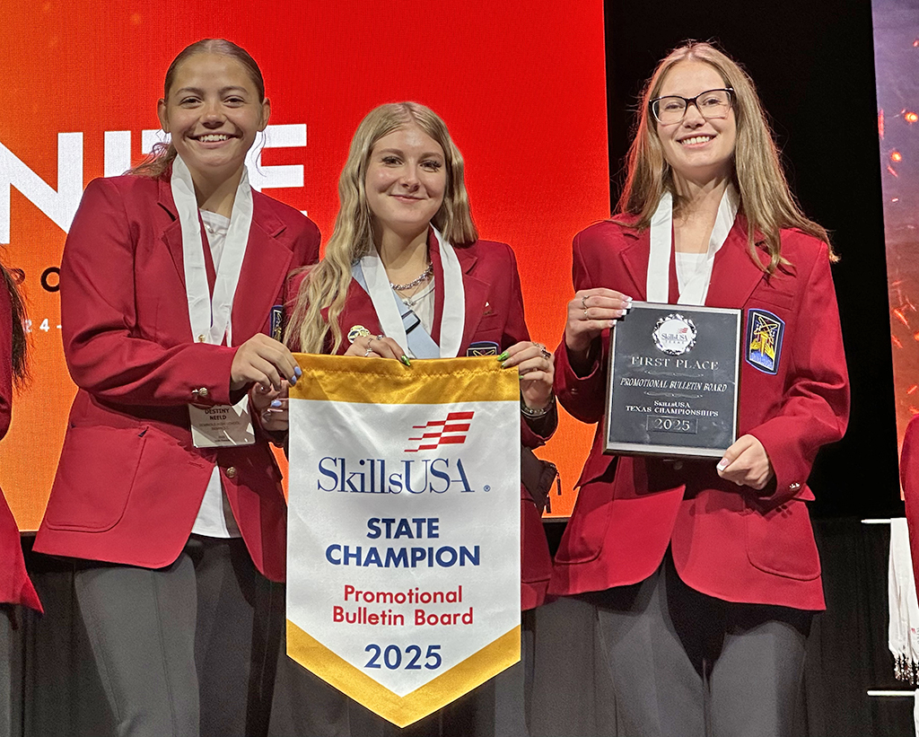 STATE QUALIFIERS--SkillsUSA sophomore Destiny Neeld, seniors Adison Thomas and Kyra Giesbrecht will compete at nationals in Atlanta in June. The trio took first place in state for their promotional bulletin board.
