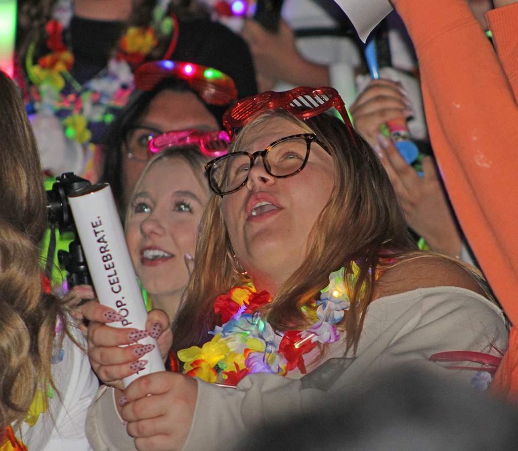 Ready, set...
Senior Ashley Banman is poised to pop her confetti container for the battle cry at the black-out pep rally on Sept. 26. The seniors won the competition.