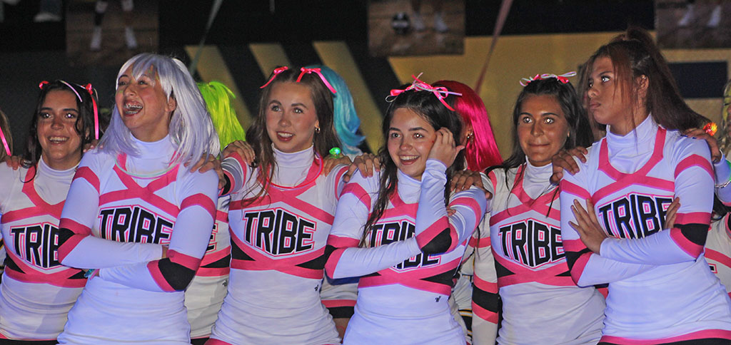 Doin' the dance--Cheerleaders perform in the dark at the black-out pep rally on Sept. 26.