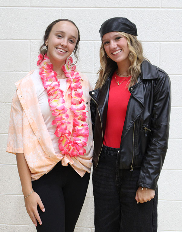 Teen beach challenge--Senior Presley Roberts and junior Zaylee Teichroeb portray dueling surfers vs. bikers on Teen Beach Monday, Sept. 8.