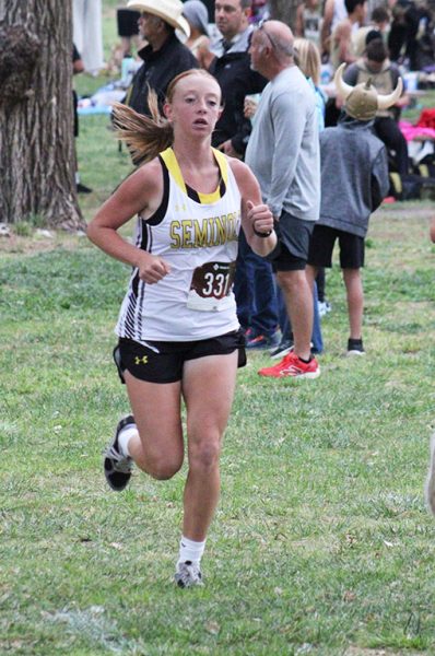 Looking for a medal--
Junior Addison Armstrong runs the second loop at Yoakum County Park on Sept. 6 at the Plains meet. Armstrong took fifth overall with a time of 12:29.50.