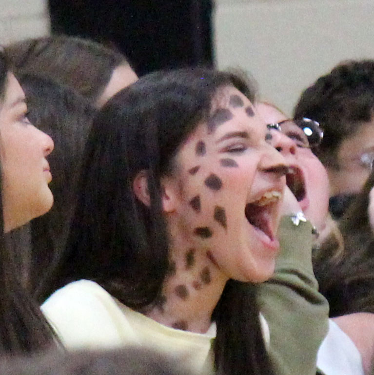 Go all giraffe--
Sophomore Jasmin Conejo screams during the sophomore battle cry in her giraffe print make up. Each class was assigned an animal print for the day.