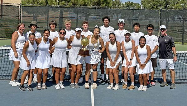 Area champions--(Back) Assistant Coach Megan Holmstrom, junior Maddox Savage, sophomore J.J. Rivera, freshman Samuel Thiessen, freshman Jacoby Armstrong, senior Tristan Hare, junior Derek Ware, junior Aldo Caballero, freshman Ruben Villalobos, Coach John Armstrong, (front) sophomore Elisia Jaramillo, junior Anastacia Vargas, junior Victoria Baros, senior Jazlynn Holmstrom, senior Karoline Caballero, senior Ivy Flores, junior Addison Armstrong, junior Tori Barrientos