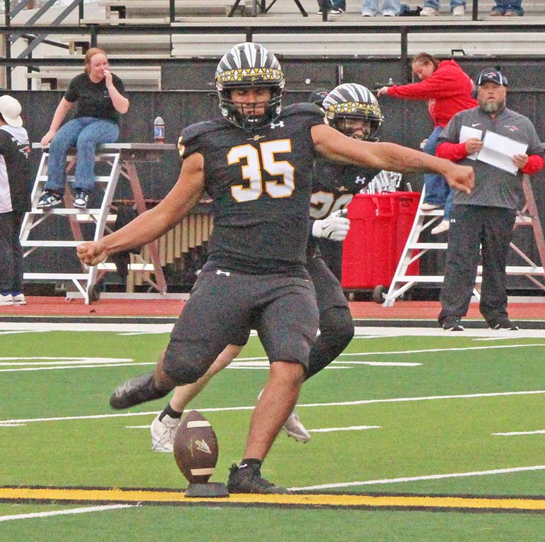 Take it home--Senior safety Austin Olivas capitalizes on Levelland's carelessness during bi-district play on Nov. 13. Olivas was named most valuable defensive player by the district coaches.