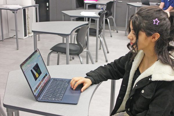 Animated project--
Freshman Carolina Hernandez watches her animated film Between the Acts after advancing to the top 13 in semifinals of the UIL’s Young Filmmaker contest.